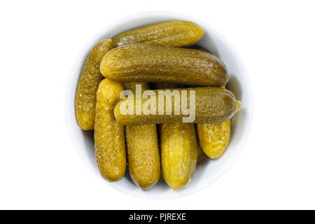 Small gherkins cucumber vegetable vegetables from above bowl isolated on a white background Stock Photo