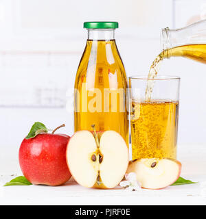 Apple juice pouring pour apples fruit fruits bottle square squared Stock Photo