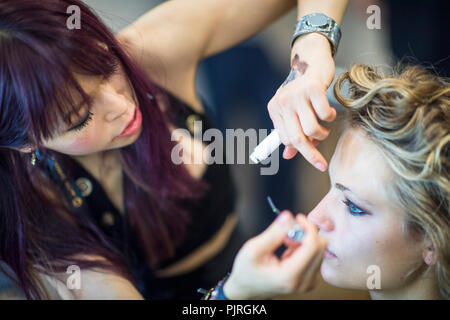 Backstage preparations for Julien Macdonald's Spring/Summer 2017 Runway Collection for London Fashion Week on September 17, 2016, in London, United Kingdom.  Julien Macdonald OBE is a Welsh fashion designer who appeared as judge on Britain's Next Top Model, named as 'British Fashion Designer of the Year' in 2001 and was appointed as chief designer at Givenchy. Stock Photo