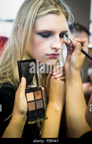 Backstage preparations for Julien Macdonald's Spring/Summer 2017 Runway Collection for London Fashion Week on September 17, 2016, in London, United Kingdom.  Julien Macdonald OBE is a Welsh fashion designer who appeared as judge on Britain's Next Top Model, named as 'British Fashion Designer of the Year' in 2001 and was appointed as chief designer at Givenchy. Stock Photo