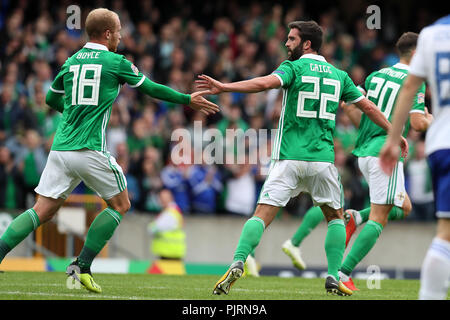 Northern Ireland's Will Grigg (right) celebrates scoring his side's first goal of the game with team-mate Liam Boyce during the UEFA Nations League, League B Group Three match at Windsor Park, Belfast. Stock Photo
