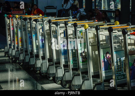 Manila, Philippines - Dec 21, 2015. Trolleys at NAIA Airport in Manila Philippines. In 2017, NAIA handled a record-breaking annual passenger traffic o Stock Photo