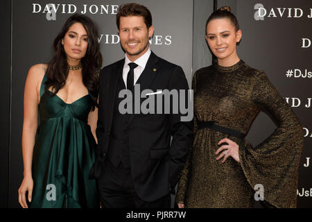 David Jones Ambassadors (L-R) Jessica Gomes, Jason Dundas and Jesinta Campbell poses for photographs during celebrations for the opening of  a new signature ‘boutique’ store in Barangaroo South in Sydney. Stock Photo