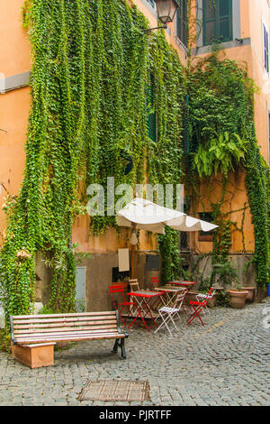 Beautiful street corner with cafe in the historic center of Rome, capital of Italy Stock Photo