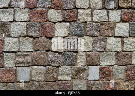 Granite brickwall texture pattern close-up shot. Background image. Stock Photo