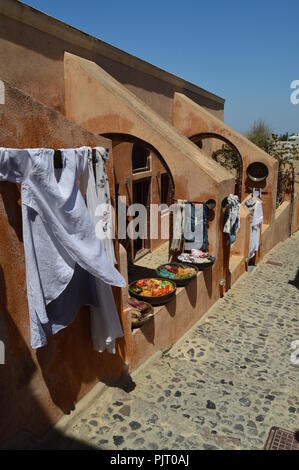 Beautiful Showcase Of A Silk Store In Oia On The Island Of Santorini. Architecture, landscapes, travel, cruises. July 7, 2018. Island of Santorini, Th Stock Photo