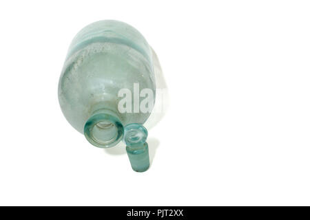 apothecary bottle, glass ground stopper with round handle, isolated on white. copyspace on background, clipping path Stock Photo