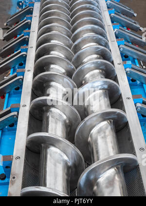 Stainless steel twin screw press for food and food by-products processing Stock Photo