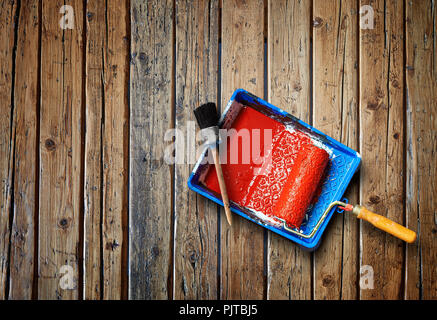 Painting tools on textured wooden table from above Stock Photo