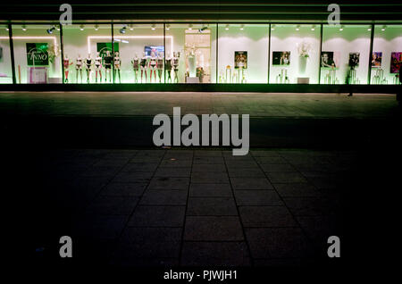 Night view of the Galeria Inno shop windows in the Rue Neuve, Brussels ...