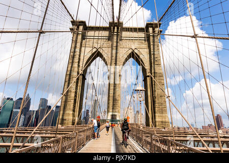 New York City. The Brooklyn Bridge, a hybrid cable-stayed suspension bridge in New York City and one of the oldest roadway bridges in the United State Stock Photo