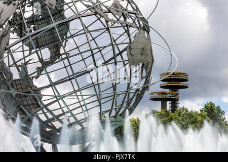 New York City. The Unisphere, a spherical stainless steel representation of the Earth in Flushing Meadows Corona Park, Queens, with the observatory to Stock Photo