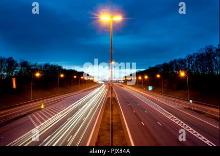 Traffic over the E40 motorway at sunset (Belgium, 01/04/2011) Stock Photo