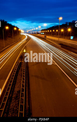 Traffic over the E40 motorway at sunset (Belgium, 01/04/2011) Stock Photo