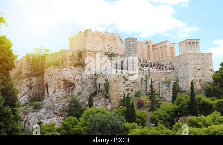ATHENS, GREECE - JULY 18, 2018: close up view of famous Acropolis with people who visit the Parthenon, Erechtheum, Propylaea and Temple of Athena in t Stock Photo