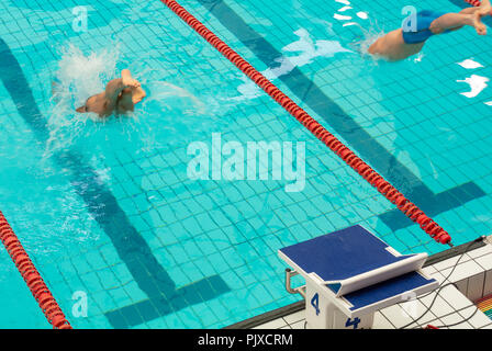 A gay athlete participant diving at swimming pool, Gay Games 2018, paris, france Stock Photo