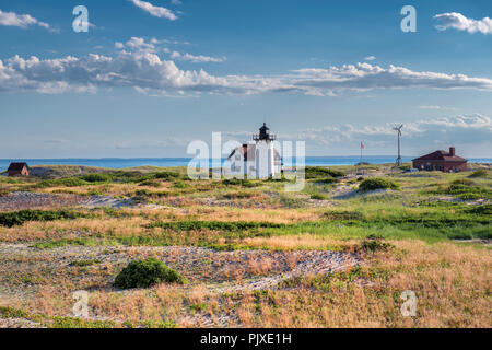 Lighthouse on sand dunes in the Cape Cod beach Stock Photo