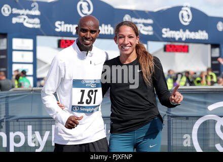 Sir Mo Farah celebrates winning the Men's Elite race along side his wife Tania Nell during the 2018 Simply Health Great North Run. Stock Photo