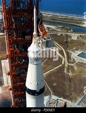 Kennedy Space Center, FL - (FILE) -- A technician works atop the white room through which the Apollo astronauts will enter their spacecraft, which is stacked at the top of a Saturn V rocket on July 3, 1969. The vehicle is being prepared for the first manned lunar landing mission. Credit: NASA via CNP /MediaPunch Stock Photo
