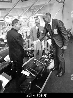 Cape Canaveral, FL - (FILE) -- Apollo 11 Lunar Module (LM) pilot Edwin E. 'Buzz' Aldrin, Jr., right, who is scheduled to make a lunar landing with Neil A. Armstrong (not pictured) greets United States Vice President Spiro T. Agnew, left, within the Spaceport's Launch Control Center on March 3, 1969.  Looking on from center is Dr. Robert Seamans, Secretary of the Air Force and former National Aeronautics and Space Administration (NASA) Deputy Administrator.  Earlier the three men viewed the launch of Apollo 9. Credit: NASA via CNP /MediaPunch Stock Photo