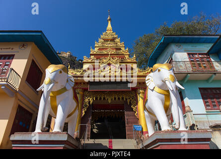 One of the entrances to the buddhist site at the top of the pedestal hill of Taung Kalat (Mount Popa), Myanmar (Burma). Stock Photo