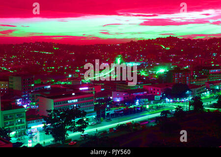 digitally manipulated aerial view over Kampala city at dusk Stock Photo