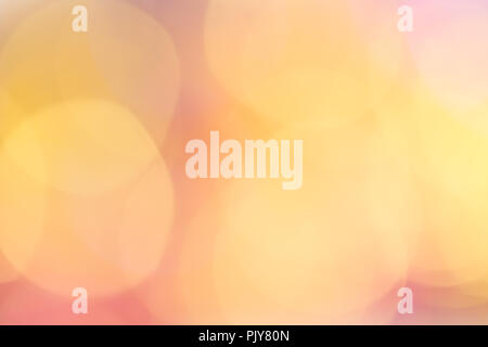 Abstract bokeh light. Christmas mood. Orange, pink, golden and blue lights. Stock Photo