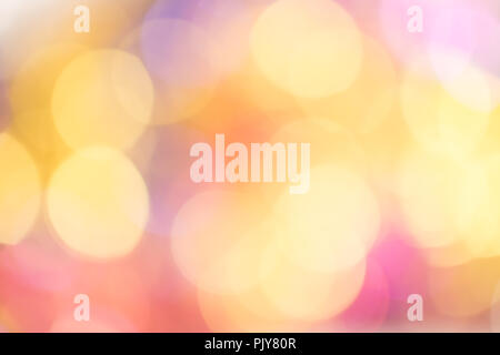 Abstract bokeh light. Christmas mood. Orange, pink, golden and blue lights. Stock Photo