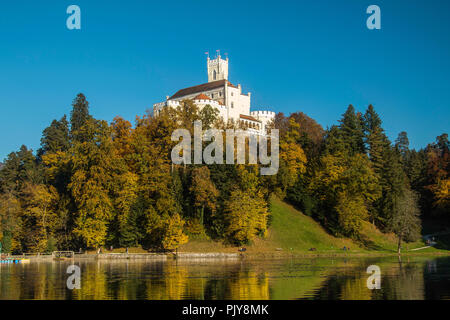 Castle of Trakoscan on the hill in autumn, Zagorje, Croatia, reflection on the lake Stock Photo