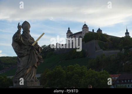 Statue of Saint KIlian on the 'alte Mainbrücke' in Würzburg, Franconia, Bavaria, Germany Stock Photo