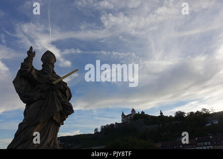 Statue of Saint KIlian on the 'alte Mainbrücke' in Würzburg, Franconia, Bavaria, Germany Stock Photo