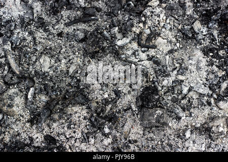 Gray ash from the oven background texture, cinder, grey ashes from the wood from the fireplace Stock Photo
