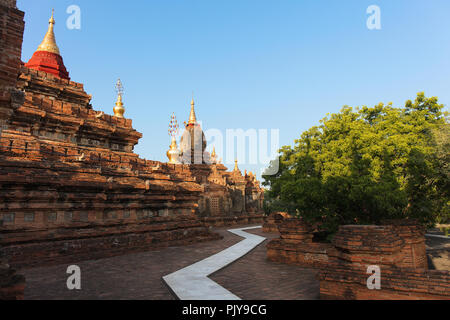 Walking path inside the Dhammayazika pagoda complex in Bagan, Myanmar (Burma). Stock Photo