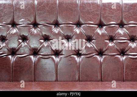 brown sofa leather as background or texture Stock Photo