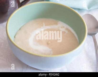 Oatmeal porridge in bowl close up - Healthy traditional breakfast food background Stock Photo