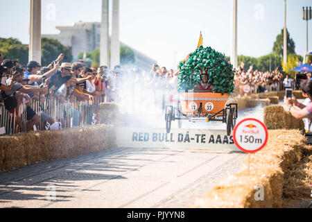 Lisbon, Portugal. 9th Sep, 2018. The car ''Manjerico'' encourages the spectators when passing through the ''jump of MarquÃªs'' at the 3rd Grand Prix Red Bull in Lisbon known as ''The Crazy Race in the World''.''The Crazy Race in the World'' is an event for amateur riders racing on handmade cars. The vehicles move by creativity and friendly competition, without ever forgetting the speed adrenaline. This race of vehicles without motor, proposes to the participants the construction of a car that defies the norms of the design and the laws of the physics. They will compete against the clock Stock Photo