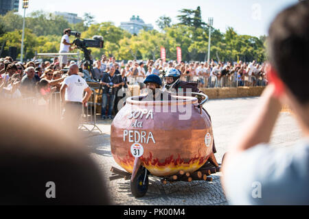 Lisbon, Portugal. 9th Sep, 2018. The car ''Sopa da Pedra'' on the way to the final line at the 3rd Grand Prix Red Bull in Lisbon known as ''The Crazy Race in the World''.''The Crazy Race in the World'' is an event for amateur riders racing on handmade cars. The vehicles move by creativity and friendly competition, without ever forgetting the speed adrenaline. This race of vehicles without motor, proposes to the participants the construction of a car that defies the norms of the design and the laws of the physics. They will compete against the clock on a sloping course, being dependent o Stock Photo