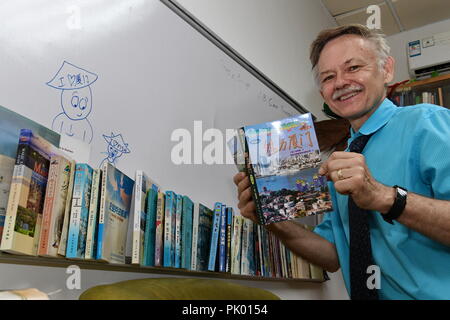Xiamen, China's Fujian Province. 14th June, 2018. William Brown displays the book he wrote in his office at Xiamen University in Xiamen, southeast China's Fujian Province, June 14, 2018. Credit: Zhang Guojun/Xinhua/Alamy Live News Stock Photo