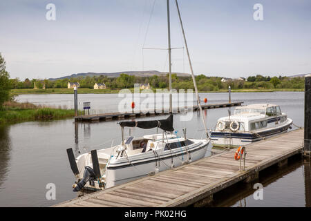 Ireland, Co Leitrim, Drumshanbo, boats moored on Lough Allen pontoon at Shannon Blueway canal locks Stock Photo