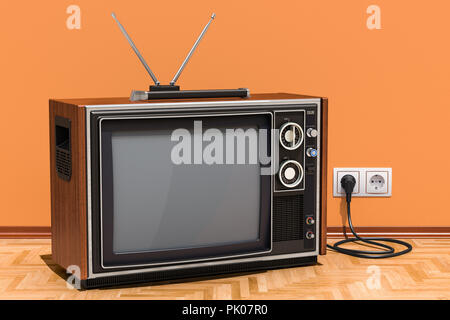 Retro TV set in room on the wooden floor, 3D rendering Stock Photo