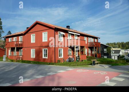 Scandinavian housing, classic red villa with blue sky Stock Photo