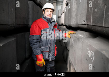 Senior Worker at Plant Stock Photo