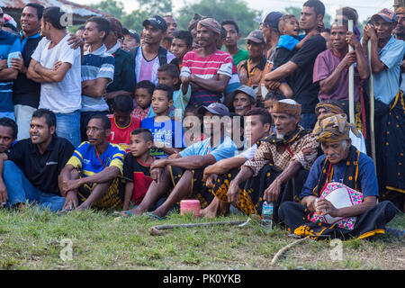 BAJAWA, INDONESIA - MAY 19: Unidentified men watch boxing near  Bajawa in East Nusa Tenggara, Indonesia on May 19, 2017. Stock Photo