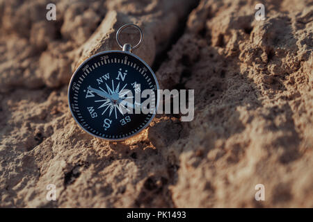 Close up view of the compass on the rock Stock Photo