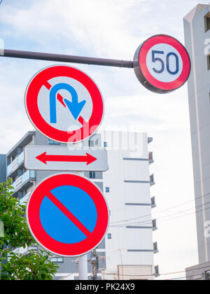 Various traffic signs on Japan road. The speed limited and no u-turn ...