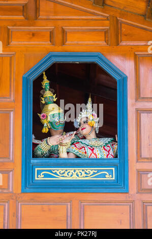 Khon, pantomime performances action of Thailand, a kind of Thai drama, Tos-sa-gan Giant performing action with beautiful si-da out of window at  Wat P Stock Photo