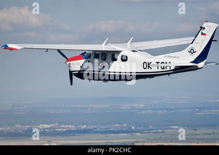 A show of original historical planes and their replicas could be seen at the 9th Letnany Airport Day in Prague, Czech Republic, on September 8, 2018, held on the occasion of the 100th anniversary of the foundation of the Czechoslovak air force and the 60th anniversary of the production of the Blanik glider. In the afternoon, acrobatic pilot Roman Kramarik, the first Czech to fly around the world in a small Cessna P210N plane (pictured), landed at the Letnany Airport, ending his mission that started at the Tocna airfield on the outskirts of Prague on July 25. (CTK Photo/Vit Simanek) Stock Photo