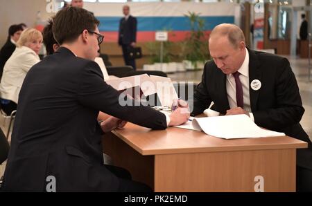 Moscow, Russia. 9th September, 2018. Russian President Vladimir Putin casts his vote in the elections for Moscow Mayor at Polling Station No 2151 in the Russian Academy of Sciences building September 9, 2018 in Moscow, Russia. The current Mayor Sergei Sobyanin is Putins former Chief of Staff and expected to win. Credit: Planetpix/Alamy Live News Stock Photo