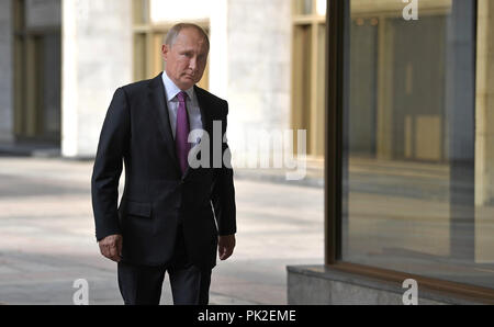 Moscow, Russia. 9th September, 2018. Russian President Vladimir Putin arrives to cast his vote in the elections for Moscow Mayor at Polling Station No 2151 in the Russian Academy of Sciences building September 9, 2018 in Moscow, Russia. The current Mayor Sergei Sobyanin is Putins former Chief of Staff and expected to win. Credit: Planetpix/Alamy Live News Stock Photo
