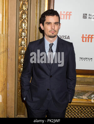 Toronto, Canada. 10th Sep, 2018. Director Damien Chazelle poses for photos before the Canadian premiere of the film 'First Man' during the 2018 Toronto International Film Festival in Toronto, Canada, on Sept. 10, 2018. Credit: Zou Zheng/Xinhua/Alamy Live News Stock Photo